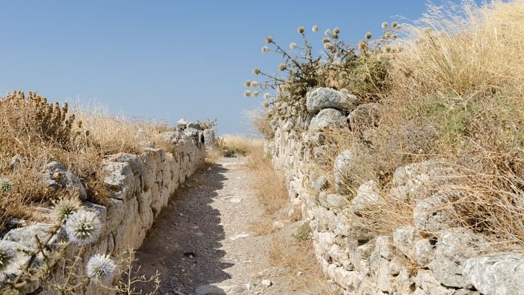 Dry stone retaining wall near Ancient Thera on Santorini, the traditional masonry and stonework technique still used for terracing across the island